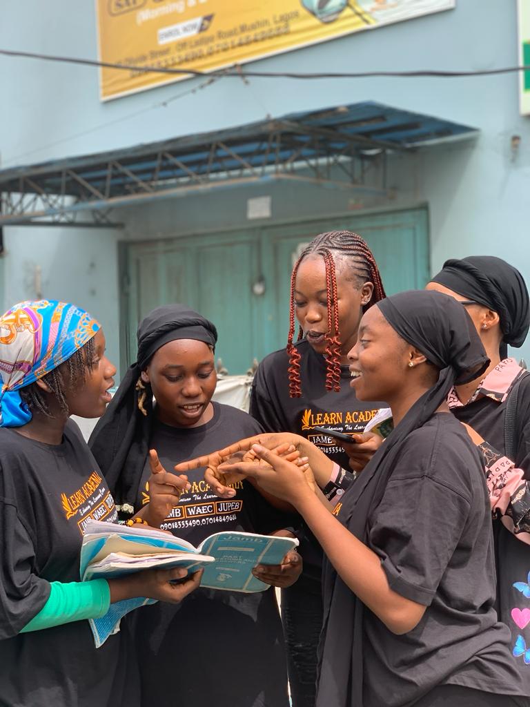 Our students reading a book