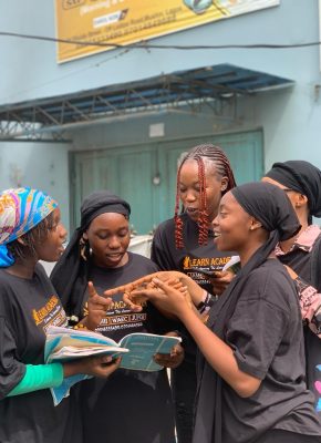 Our students reading a book